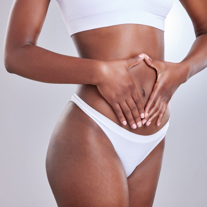 Woman,,Body,And,Hands,Frame,On,Stomach,For,Nutrition,,Beauty