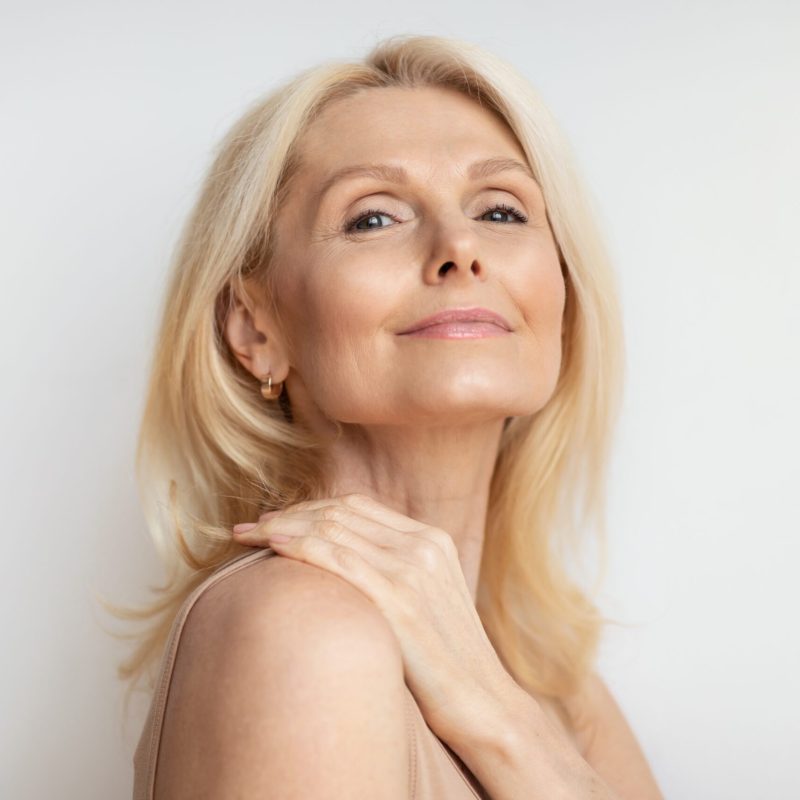 Portrait,Of,Attractive,Senior,Woman,With,Bare,Shoulders,And,Perfect